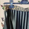 Falda Plisada Negra Brillo Elástico Animal Print
