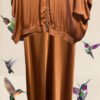 Conjunto Bomber y falda de seda satinada